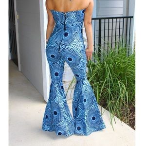 Long flare leg jumpsuit with cut out back